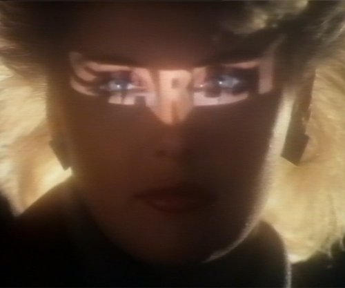Starlet commercial screenshot with the word Starlet beamed onto the face of a model