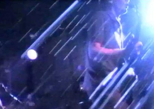 A blurry image of a band gig.