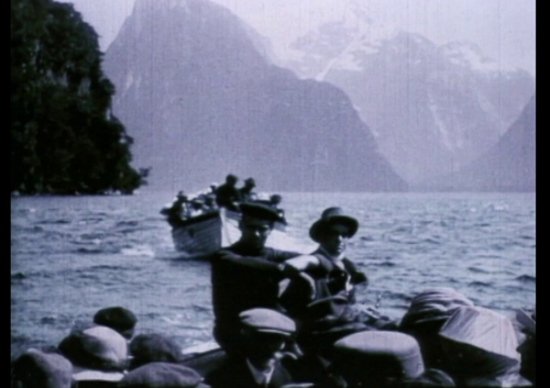 Tourists aboard boats at Milford Sound.