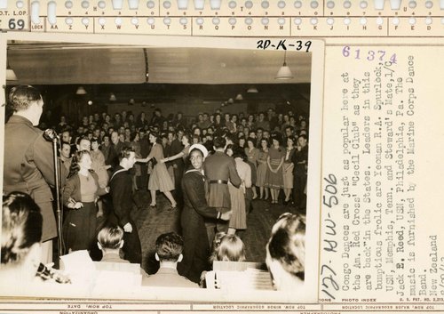 A congo line at the American Red Cross "Cecil Club" in Wellington during WWII.