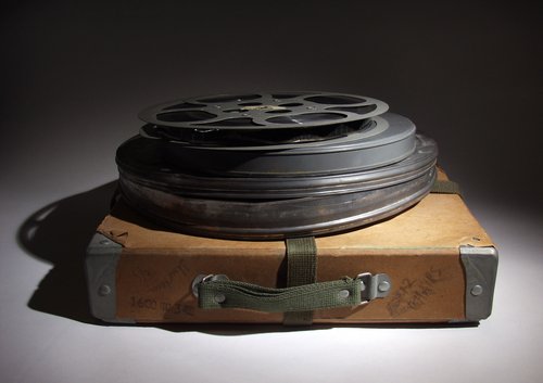 Film reel on briefcase