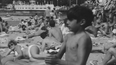Still from Gregg's Coffee TV advert - people on the beach at Oriental Parade.