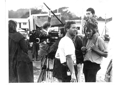 Geoff Murphy on-set with his son, Heperi Mita, on his shoulders.