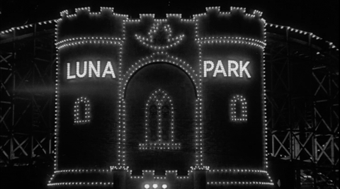 A castle at Luna Park in Auckland lit up at night