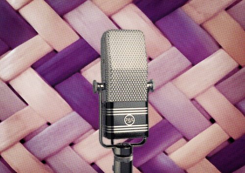 Microphone against a background of purple weaving
