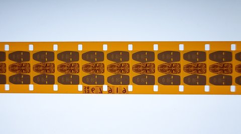 A strip of film from the series Tangata Whenua on the workbench