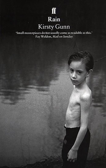 The cover of the book Rain by Kirsty Gunn, which shows a young boy in front of a river looking at the camera.