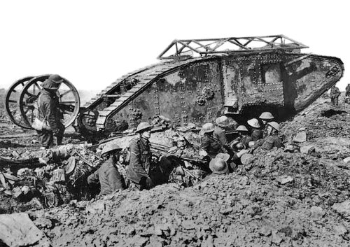 Black and white image of soldiers in a trench next to a tank near Thiepval in 1916.