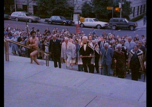 Kaumātua walking up front steps of the MET in New York.