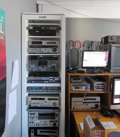 A rack of decks and servers for video capture.