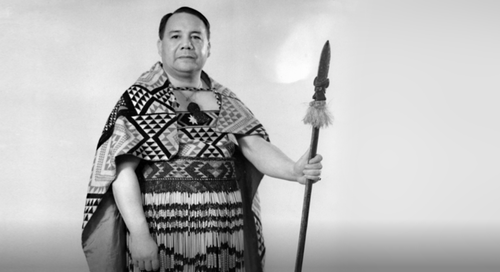 Image of Te Aritaua Pitama, holding a spear (taiaha).