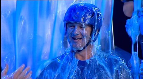 Someone being 'gunged' on children's television programme 'What Now?'.