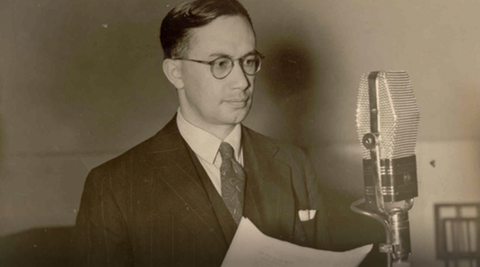 Image of Wiremu Parker with a radio microphone.